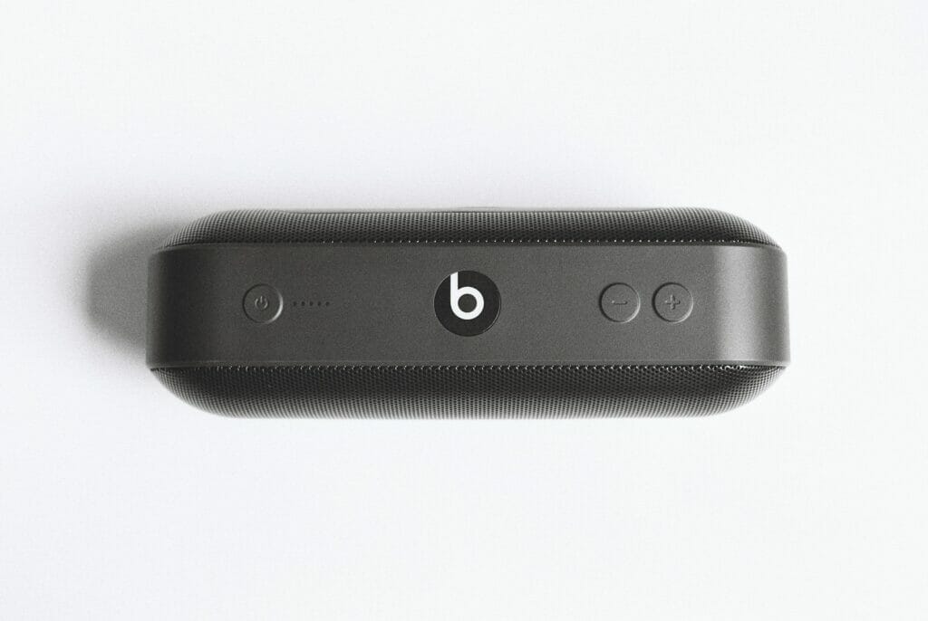 black Beats by Dr Dre beatspill + on white surface