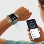 A person syncing a smartwatch with a smartphone displaying health data icons, connected by wireless signals.