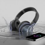 Bluetooth headphones partially submerged in water with visible damage and a nearby device showing a disconnected symbol.
