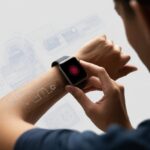 Smartwatch Error Code 9001 Fix: When Your Wrist Decides to Rebel Close-up of a person interacting with a smartwatch showing an error symbol, surrounded by digital diagnostic icons.