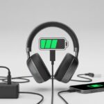 Why do my Bluetooth headphones charge slowly? Top Reasons Your Headphones Are Practicing Patience Bluetooth headphones connected to a charging cable with a slow charging progress icon above them and visual hints of a dim power adapter and tangled cable nearby.