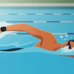 A person swimming in a pool wearing a fitness tracker on their wrist, with water splashing around them.