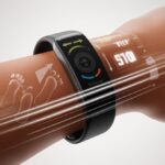 How do fitness trackers count steps? Magic, Math, or Miniature Coaches in Your Pocket? A close-up of a wrist wearing a fitness tracker, showing the device's internal sensors detecting movement and counting steps.