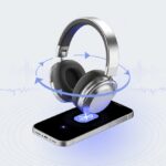 Why Do My Bluetooth Headphones Keep Restarting? The Mysterious Case of the Perpetual Power Cycle A pair of Bluetooth headphones floating above a smartphone with circular arrows around the headphones indicating restarting.