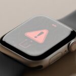 Smartwatch error code 1003 meaning: Why Your Wrist Gadget Just Had a Mini Meltdown A close-up of a modern smartwatch showing a red warning icon on its screen, indicating a technical error.